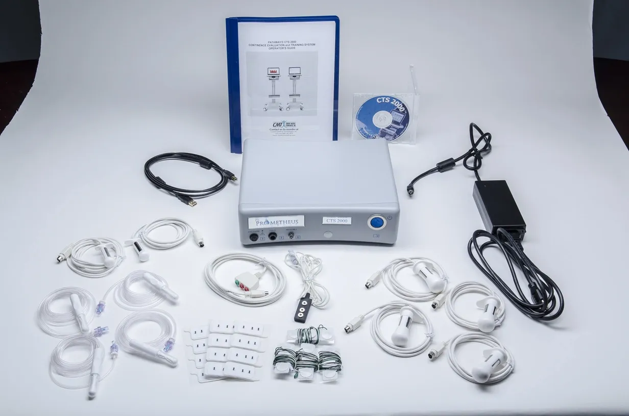 Pathway CTS-2000 Pelvic Floor Biofeedback System with cables, electrodes, power adapter, manual, and software CD on a white background.